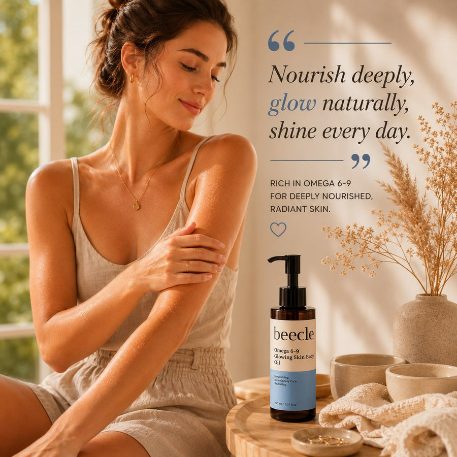 Woman applying lotion with a bottle of beecle Omega 6-9 skincare oil in the foreground.